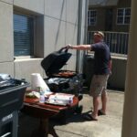 BBQ at thurman campbell group for employee appreciation jeff henley cpa cooking on grill